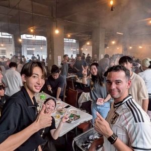 A group of people at a Japanese dining hall